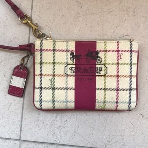 Patterned Coach wristlet
